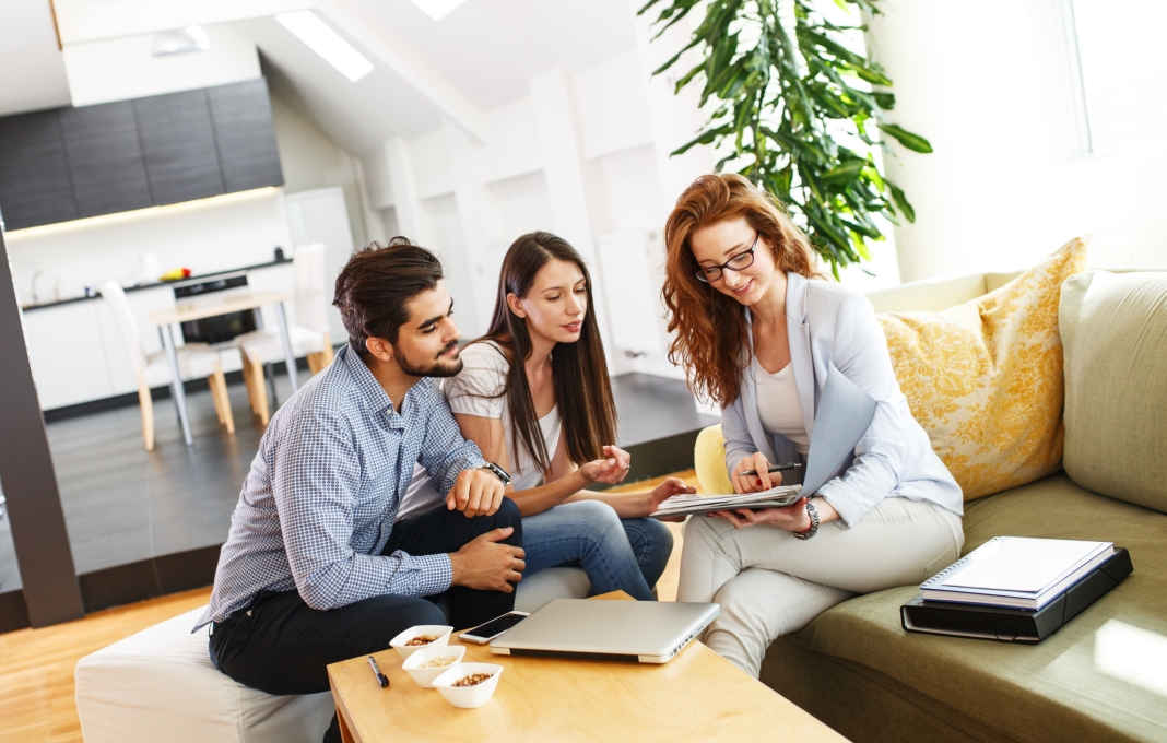 Female Real Estate agent offer home ownership and life insurance